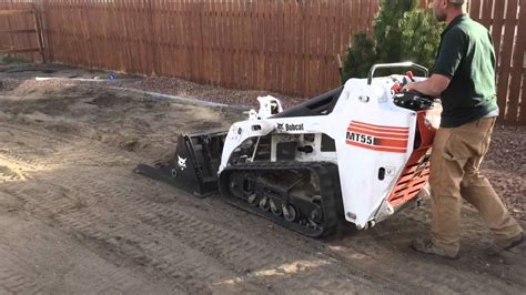 using a mini skid steer to level ground|skid steer land leveling attachments.